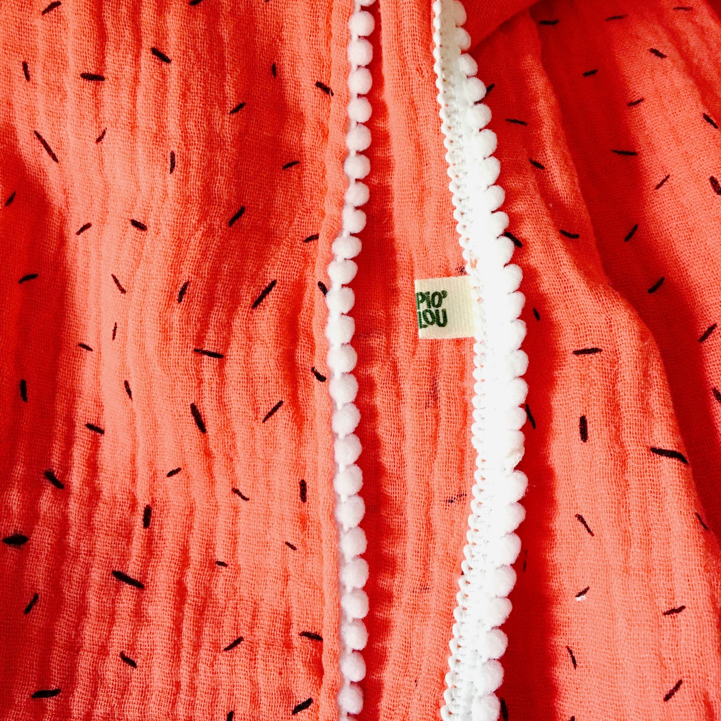 Foulard double gaze de coton corail à motifs et pompons blancs
