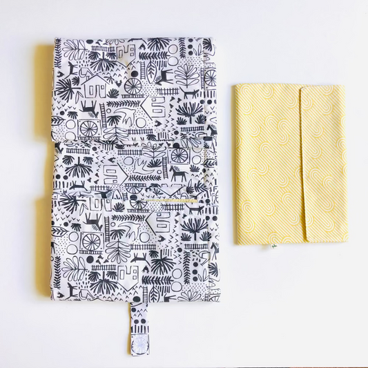 tapis a langer nomade jaune noir et blanc