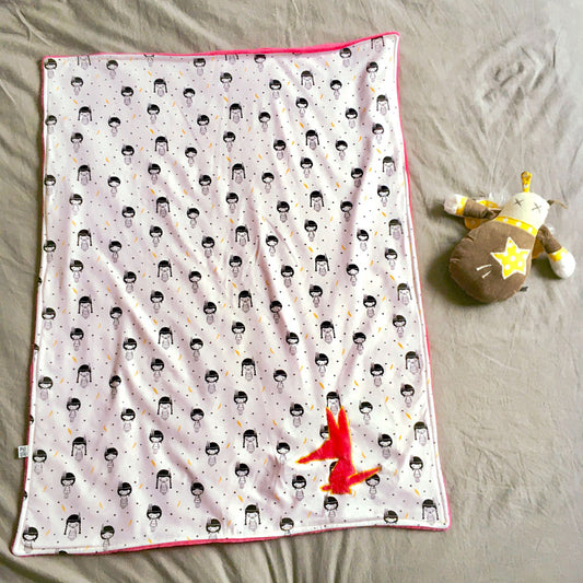 Couverture rose et blanche à motifs indienne