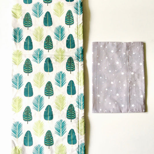 Tapis à langer nomade gris feuilles