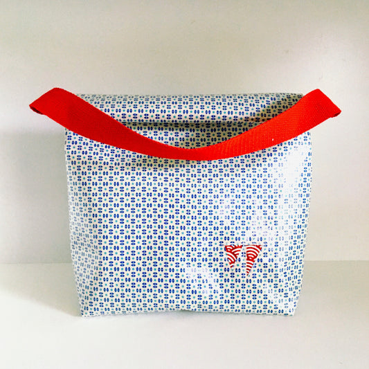 Lunch bag enduit blanc à motifs bleus