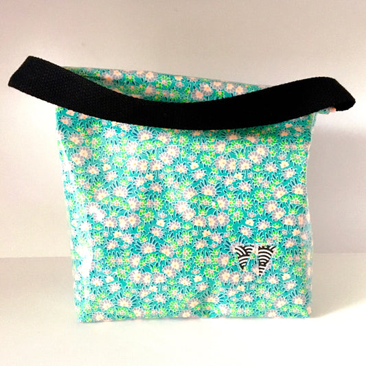Lunch bag enduit vert à motifs fleuris
