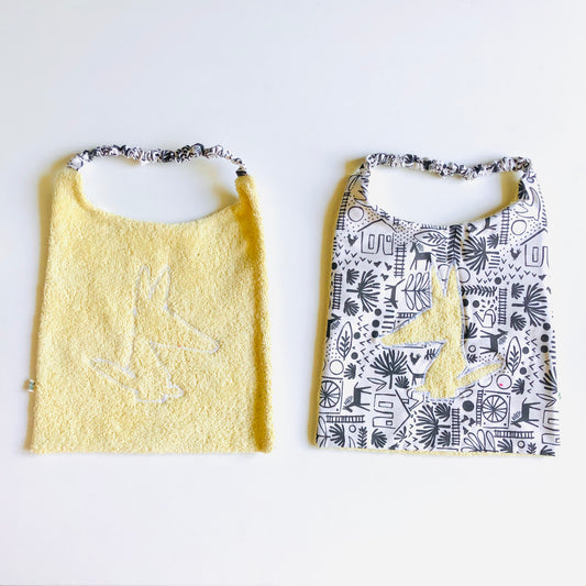 Bavoir en éponge et coton Jaune anis motifs Noir et blancs