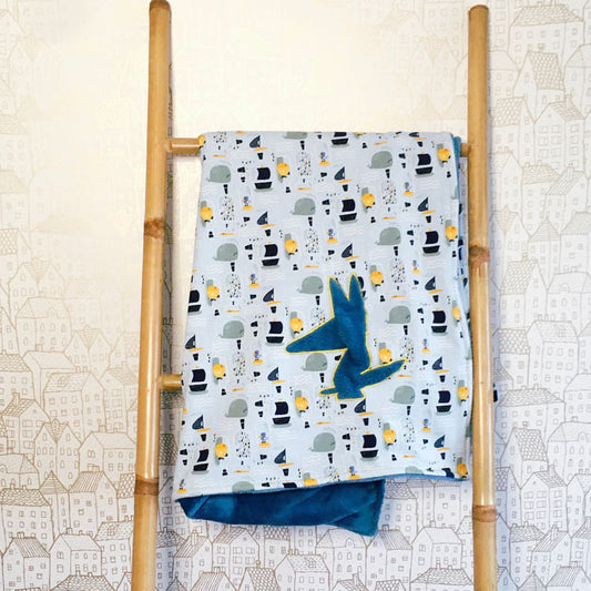 Couverture bleue à motifs poissons